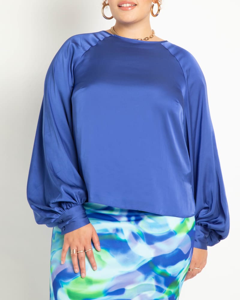 Front of a model wearing a size 18 Poet Sleeve Blouse With Tie Back- Cobalt in Cobalt by ELOQUII. | dia_product_style_image_id:283705